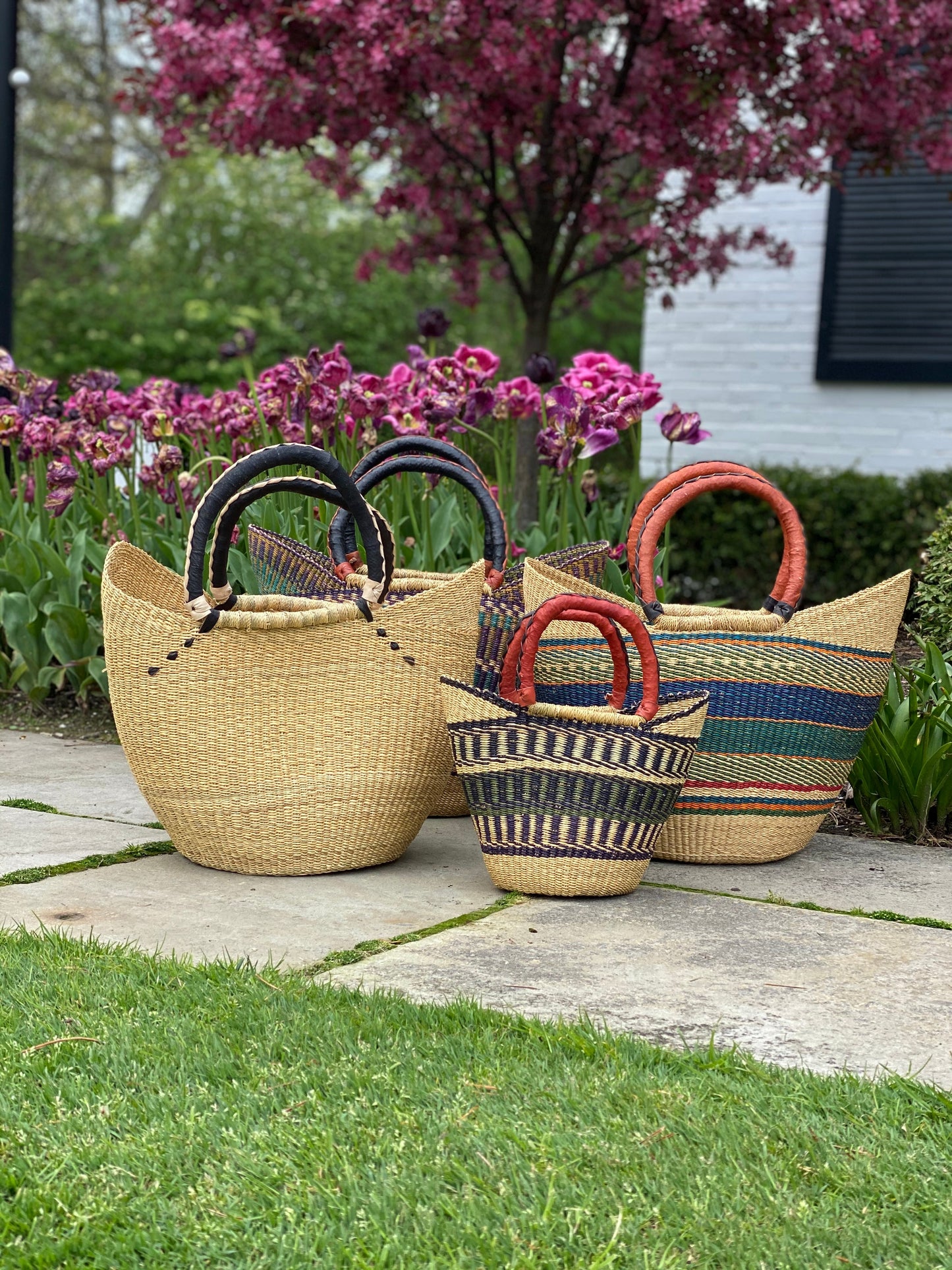 Bolga Tote with Leather Handle, approx. 16”~18” wide (at top) x 11”-13” tall ~ colors will vary