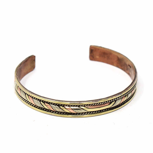 Brazalete de cobre y latón: Giro curativo - DZI (J)